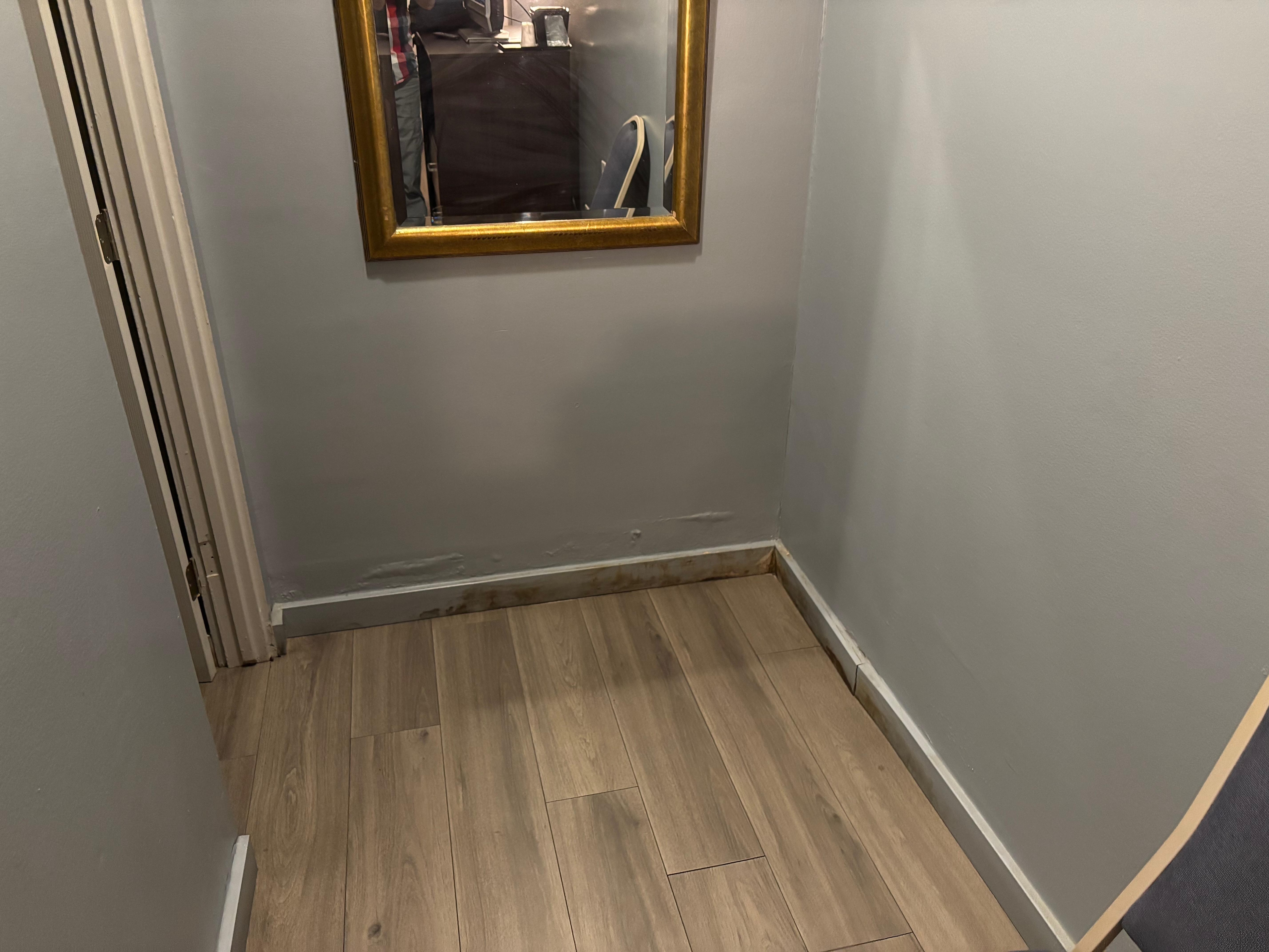 Stained floor and wall