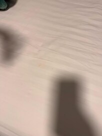 Dirty stained comforter