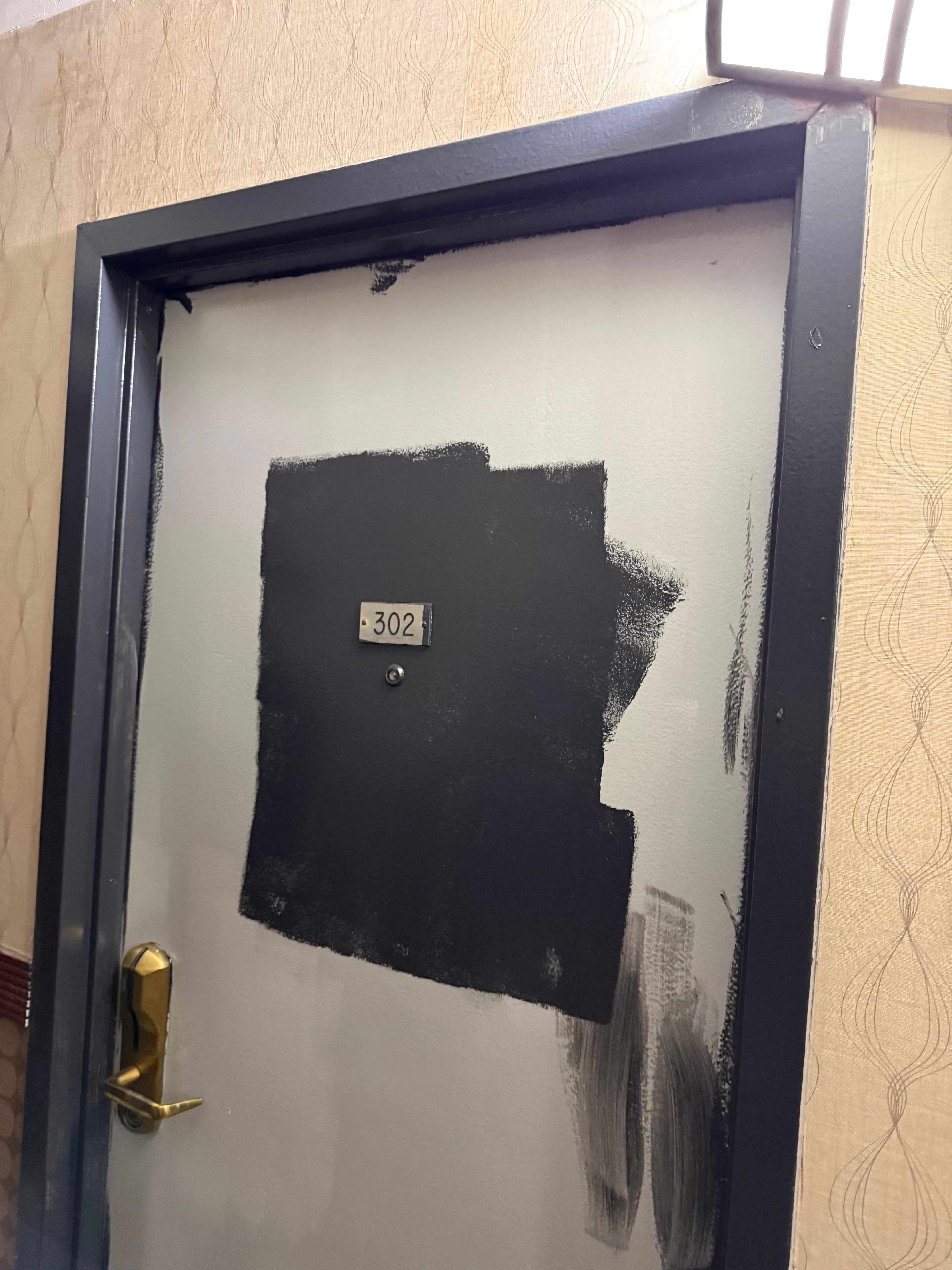 Our door being painted like it’s in the middle of being worked on