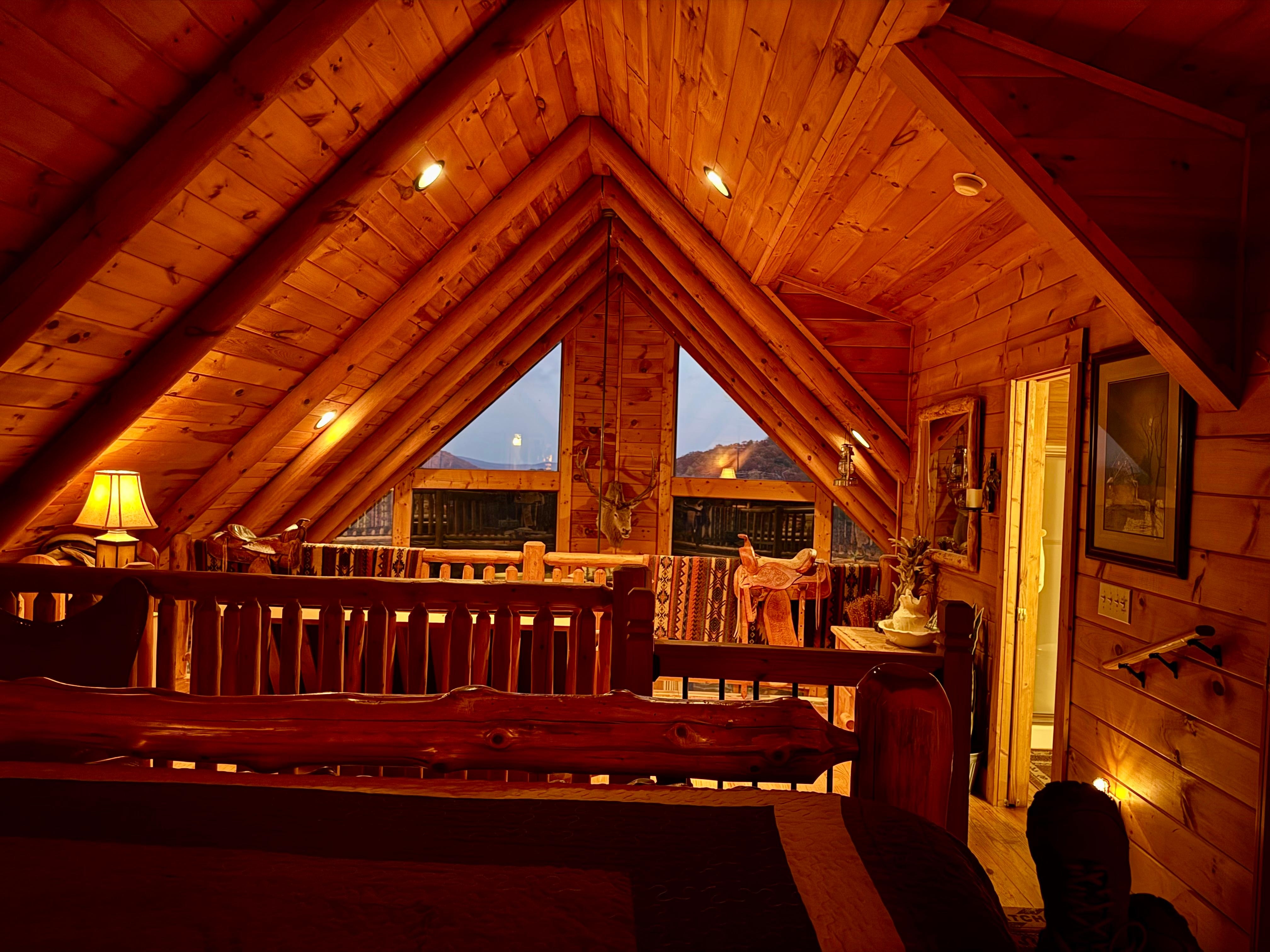 Master loft with cute reading nook with futon