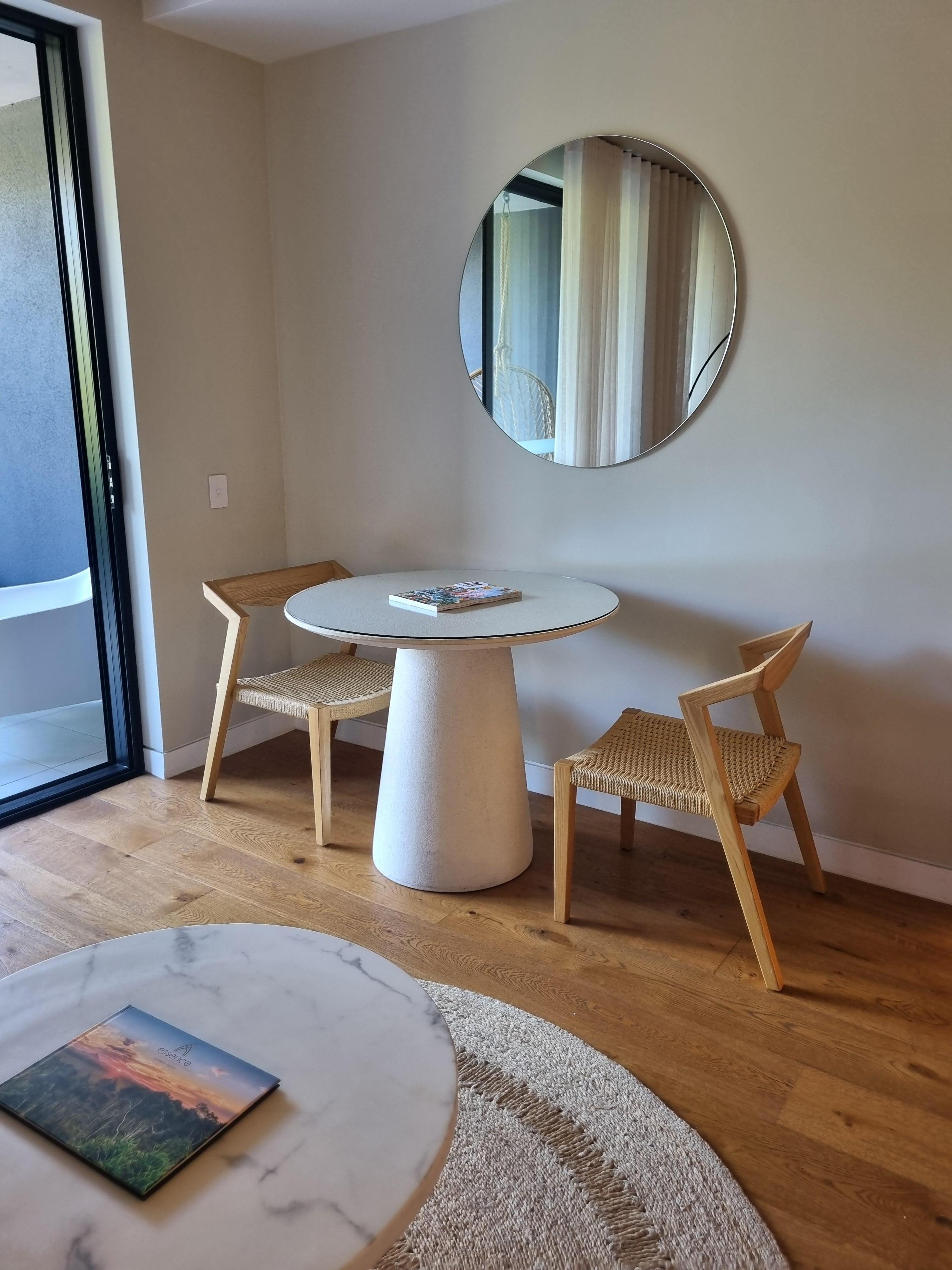 Convenient table and two chairs for dining (or working).