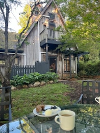 Breakfast overlooking the whimsical backyard!