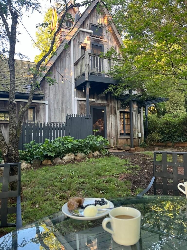 Breakfast overlooking the whimsical backyard!