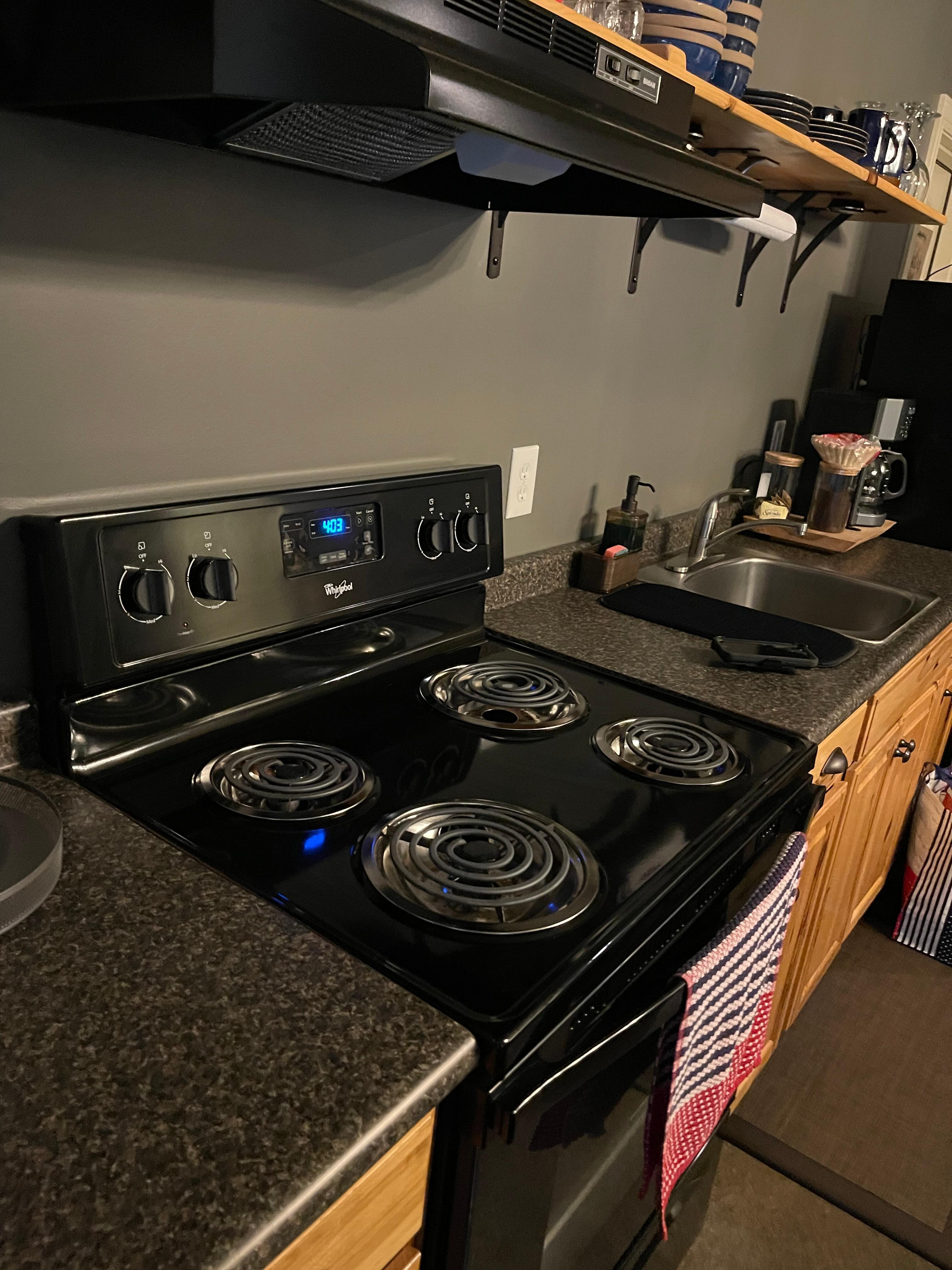 Angle of the kitchen coming in the door.