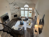 Large loft outside of the kids bedroom. There is a changing table and a crib in there as well.