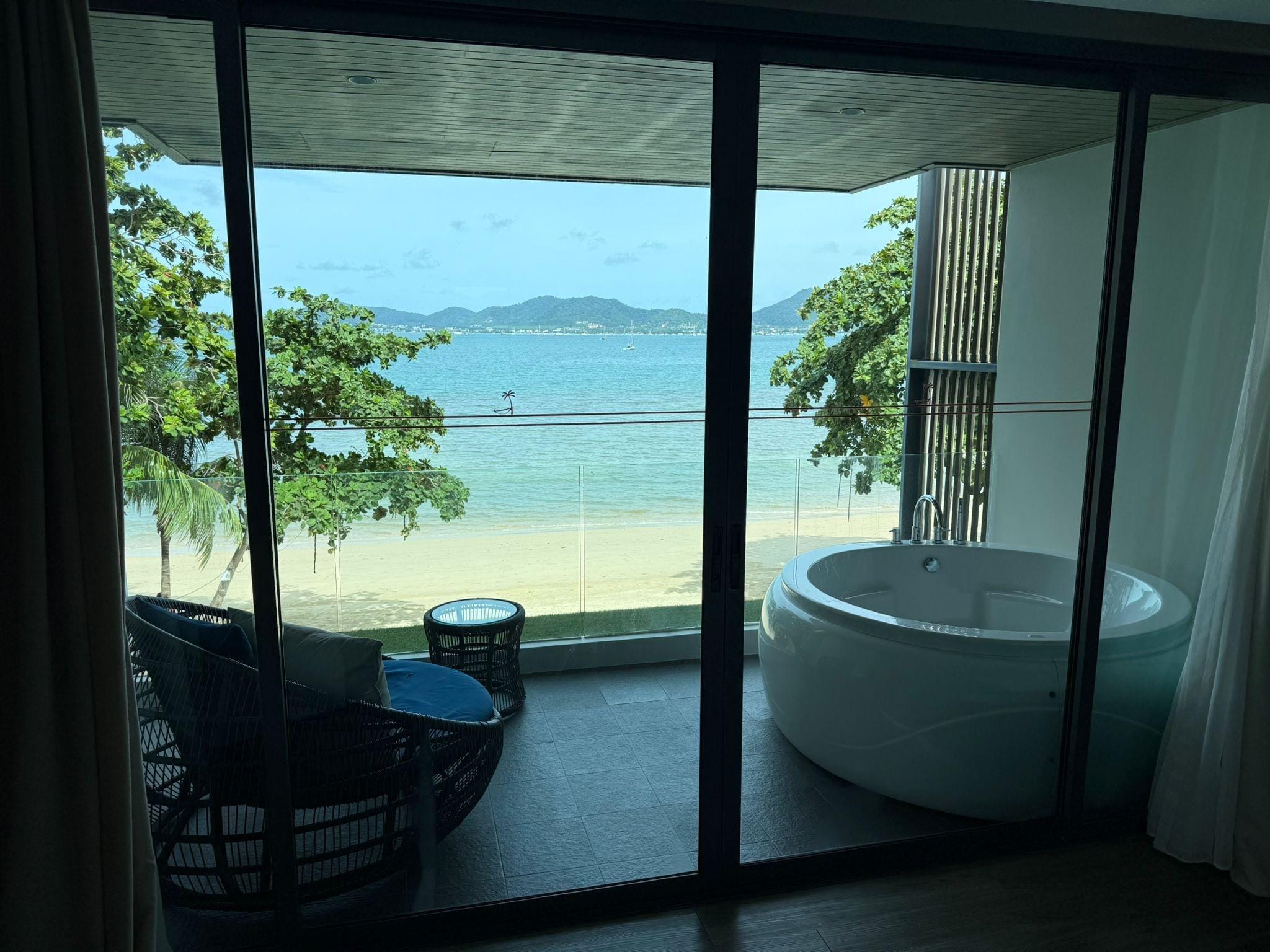 Our room with large bathtub on balcony 
