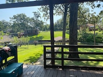 Lovely deck! Plenty of good seating. Nice early morning outside!