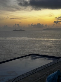 Sunrise overlooking the pool and ocean