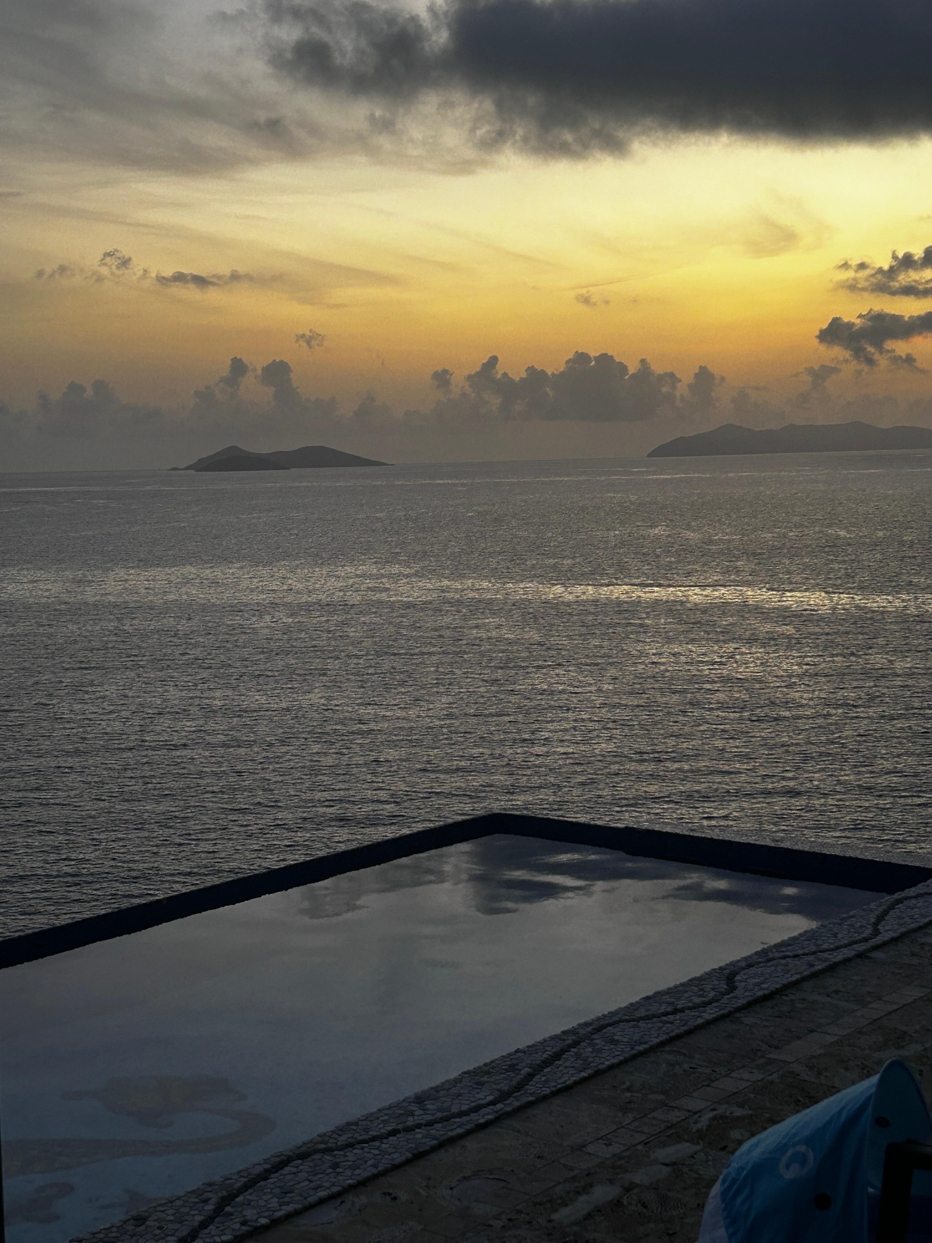 Sunrise overlooking the pool and ocean