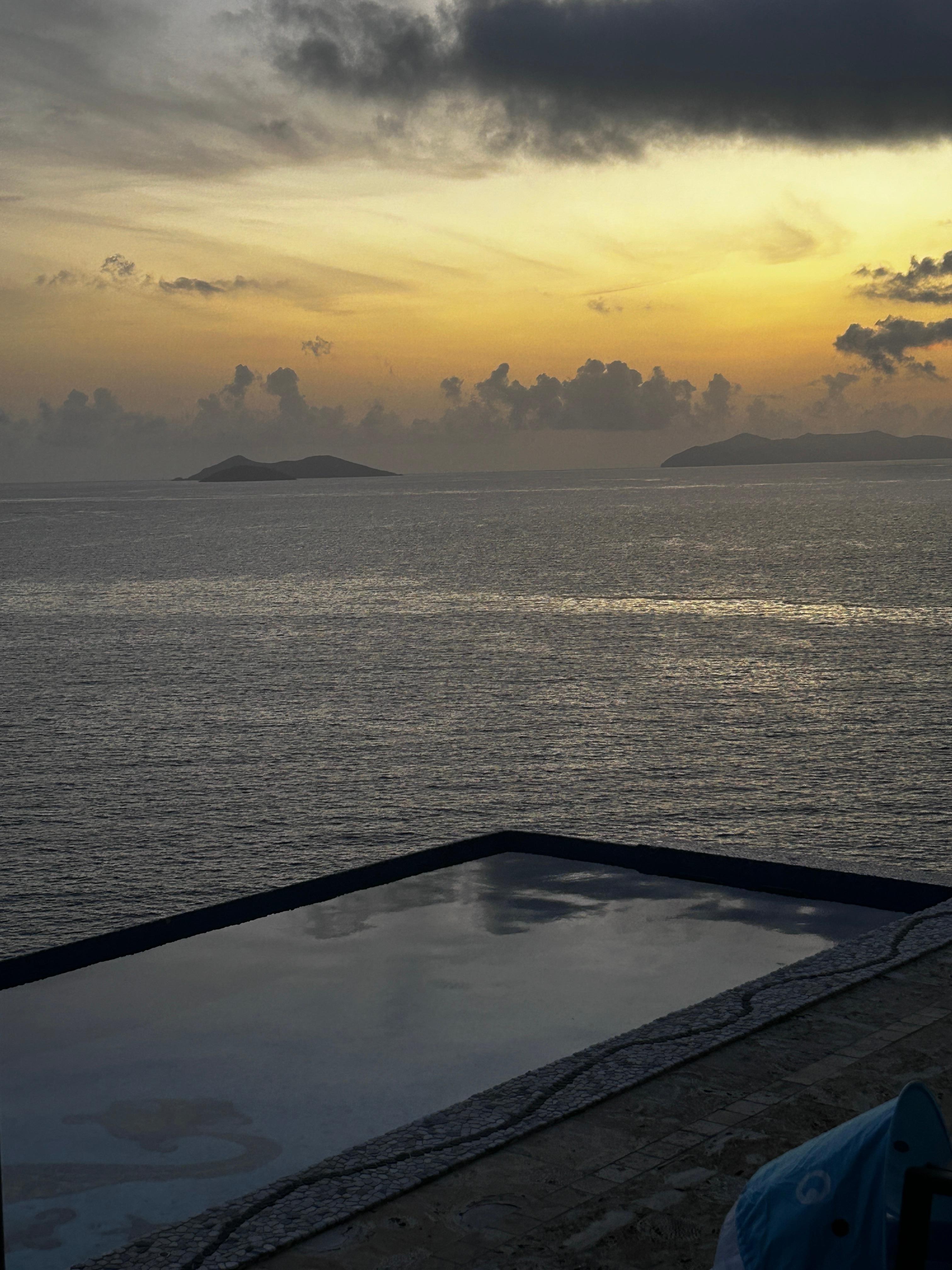 Sunrise overlooking the pool and ocean