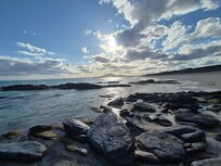 The beach in front of the house.