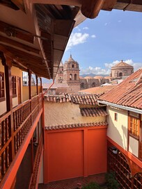 View over rooftops to San Pedro Cathedral and Market 1/2 block away.