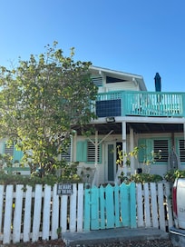 Beware of dog, because he may want to be petted every time you come home.