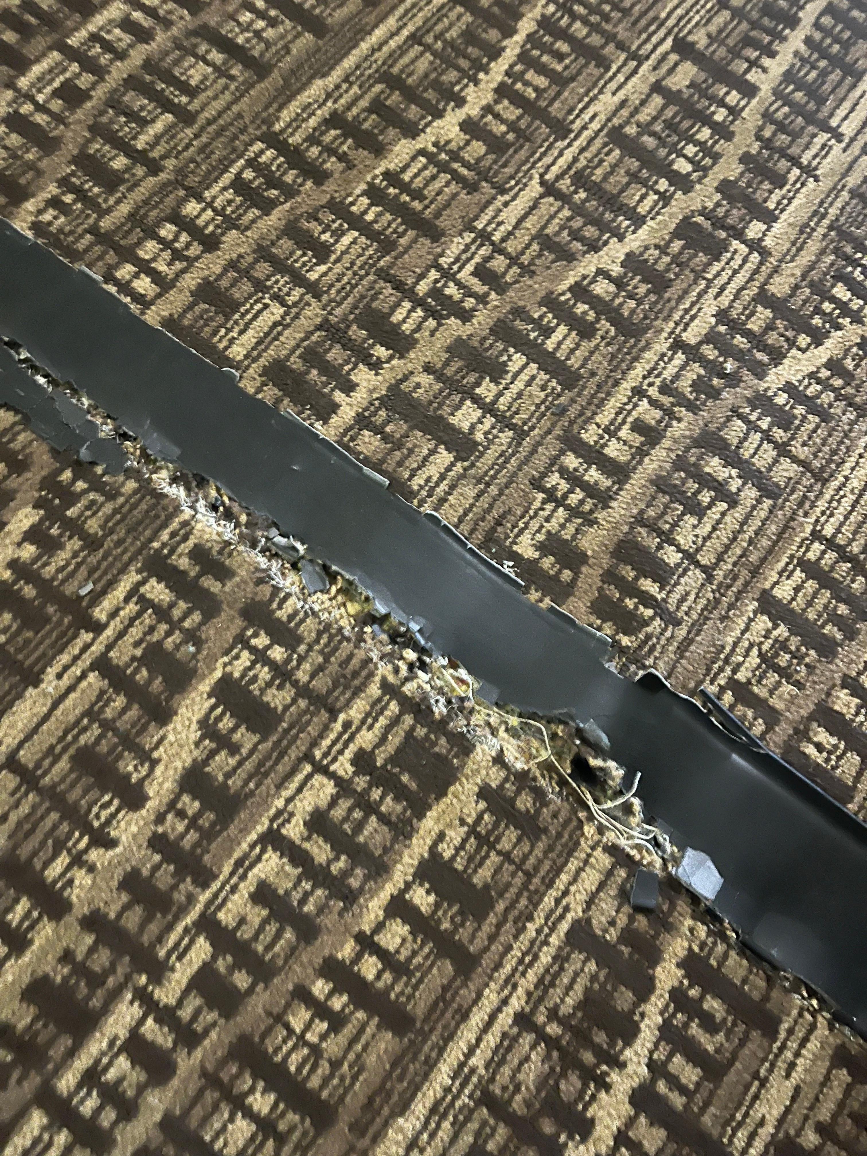 Alfombra fuera de la habitación 