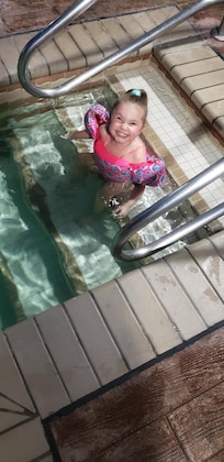 My lil one enjoying the pool