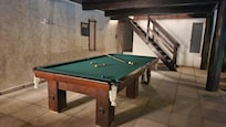 Mesa de juego, en zona techada al aire libre