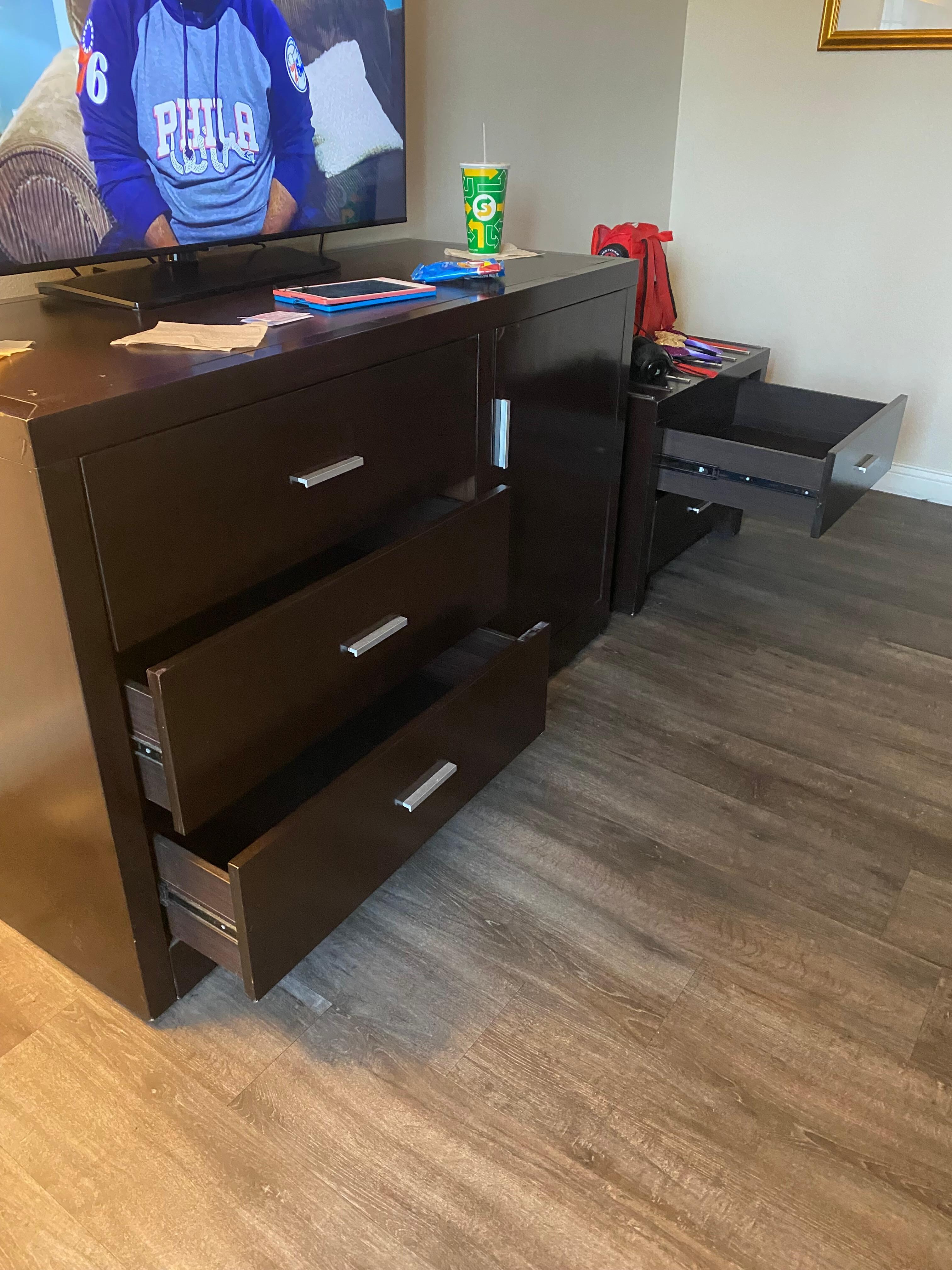 Dresser drawers on the other side of the room from nightstand that wouldn’t stay closed because of the floor being sloped. *this was the 4th floor.