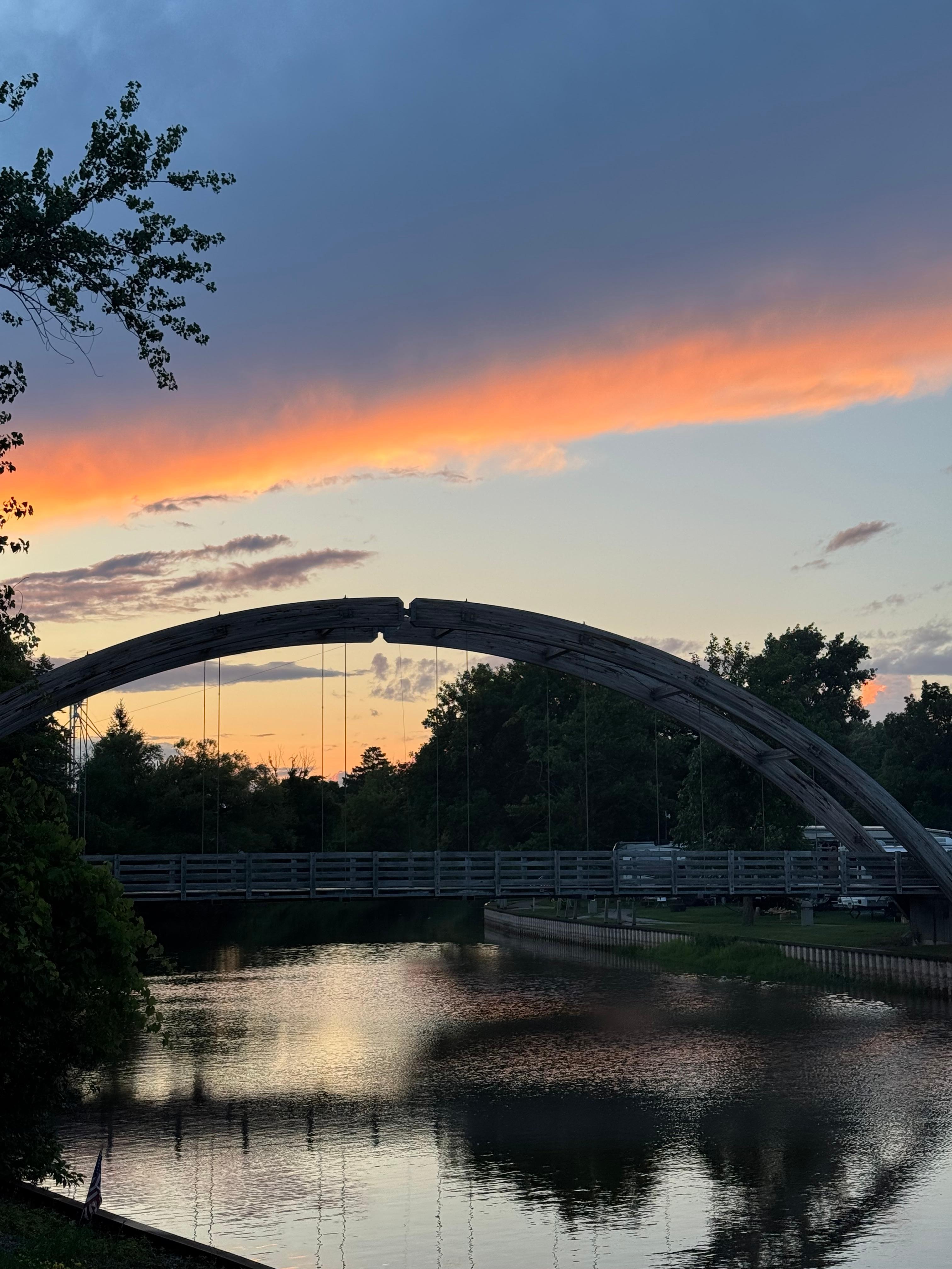 View from the house deck - bridge that leads you into the campground. 