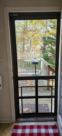 A nice looking (George Foreman) electric grill on the deck.  We didn't use it, but sure could be nice.  And... more trees!