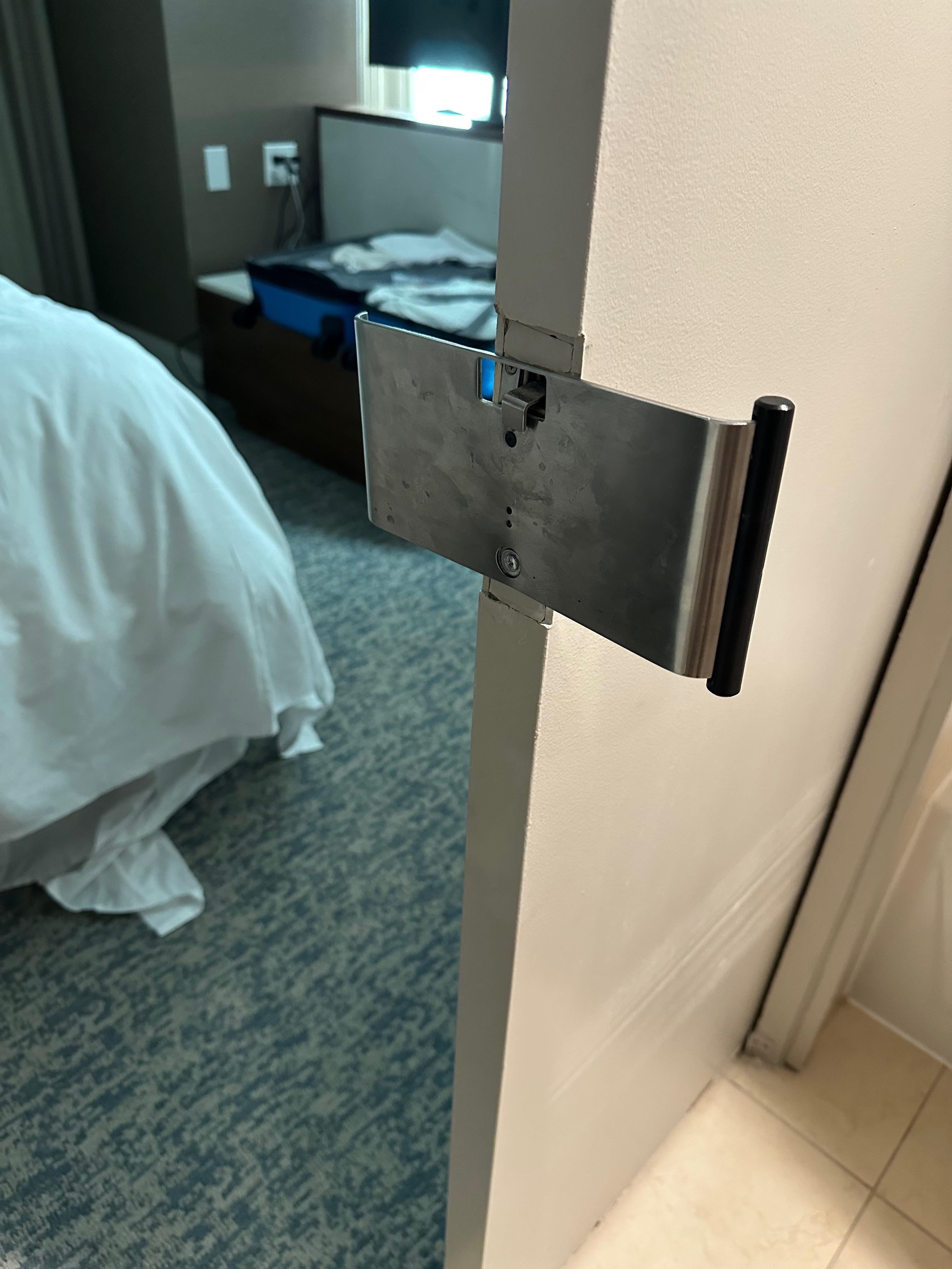Watch out for this big metal plate on the sliding door to the bathroom!