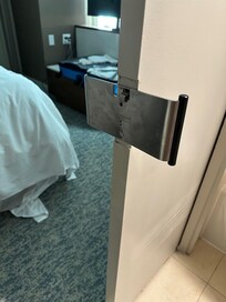 Watch out for this big metal plate on the sliding door to the bathroom!