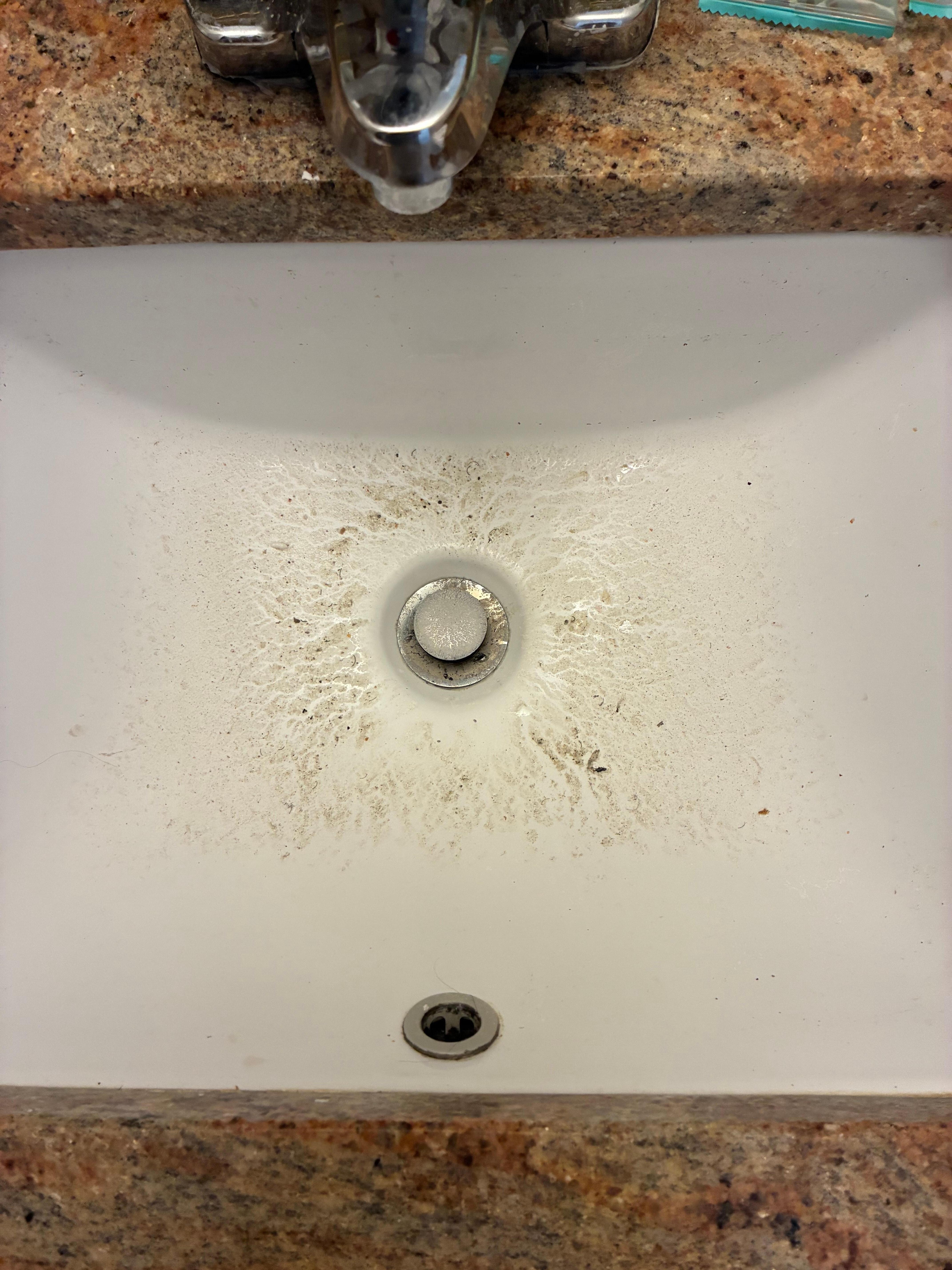 After sink finally drained there was a backup from the drain of dirt