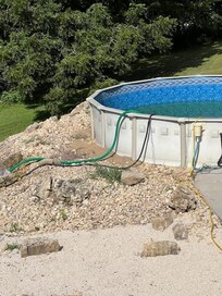 draining pool and weeds