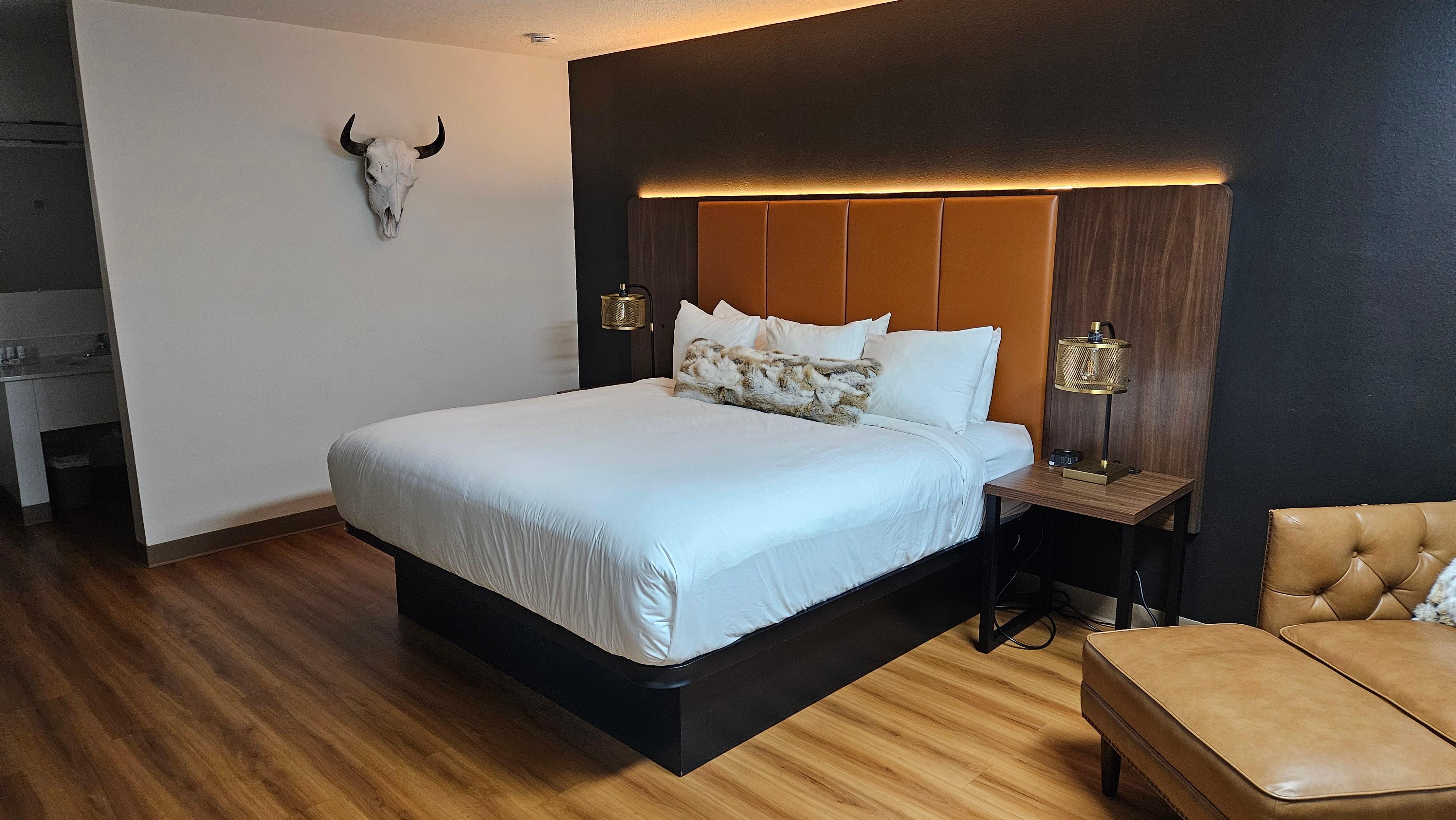 King size bed, photo taken from door