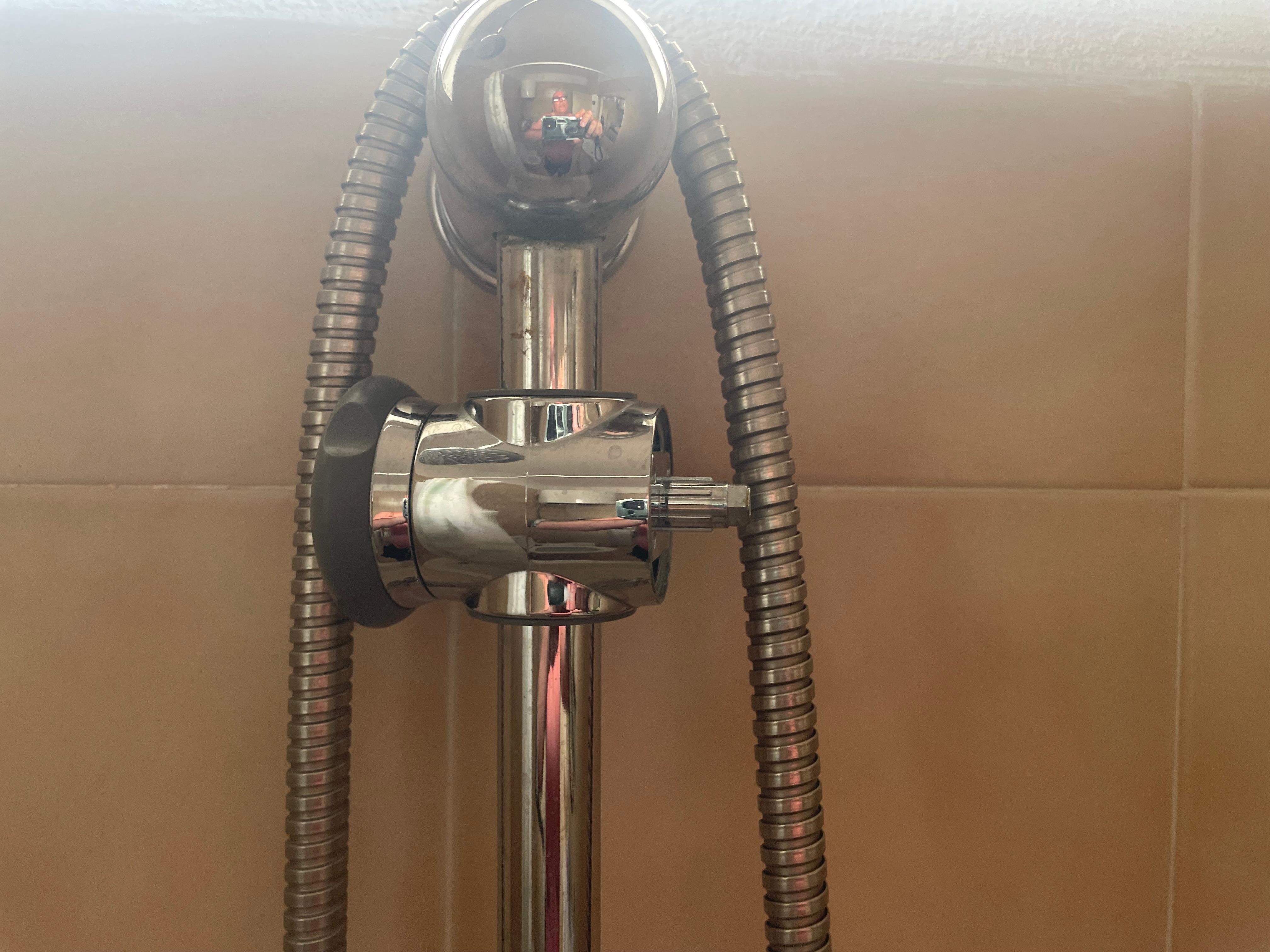 Had to hold the shower head as the arm part was missing