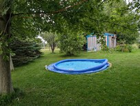 Pool that was allegedly damaged by previous occupants. Easily there since well over a month. Neighbours stated property never had the one advertised on site