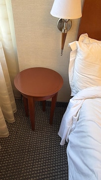 No chargers or wall plug on the side of bed