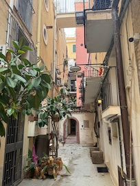 Alley behind hotel rooms