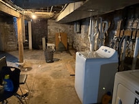 The washer and dryer are in the basement.