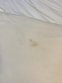 stained bed sheets