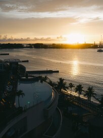 sunset seen from the room. On the right, adult only pool.