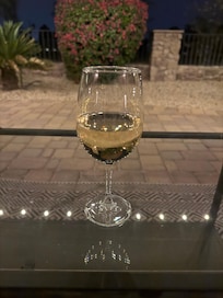 Wine on the front porch….taking in the incredible smells of the bushes!!