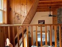 Best seat in the house- recliner on the loft. It’s the perfect reading nook with mountain views and fireplace views at the same time.