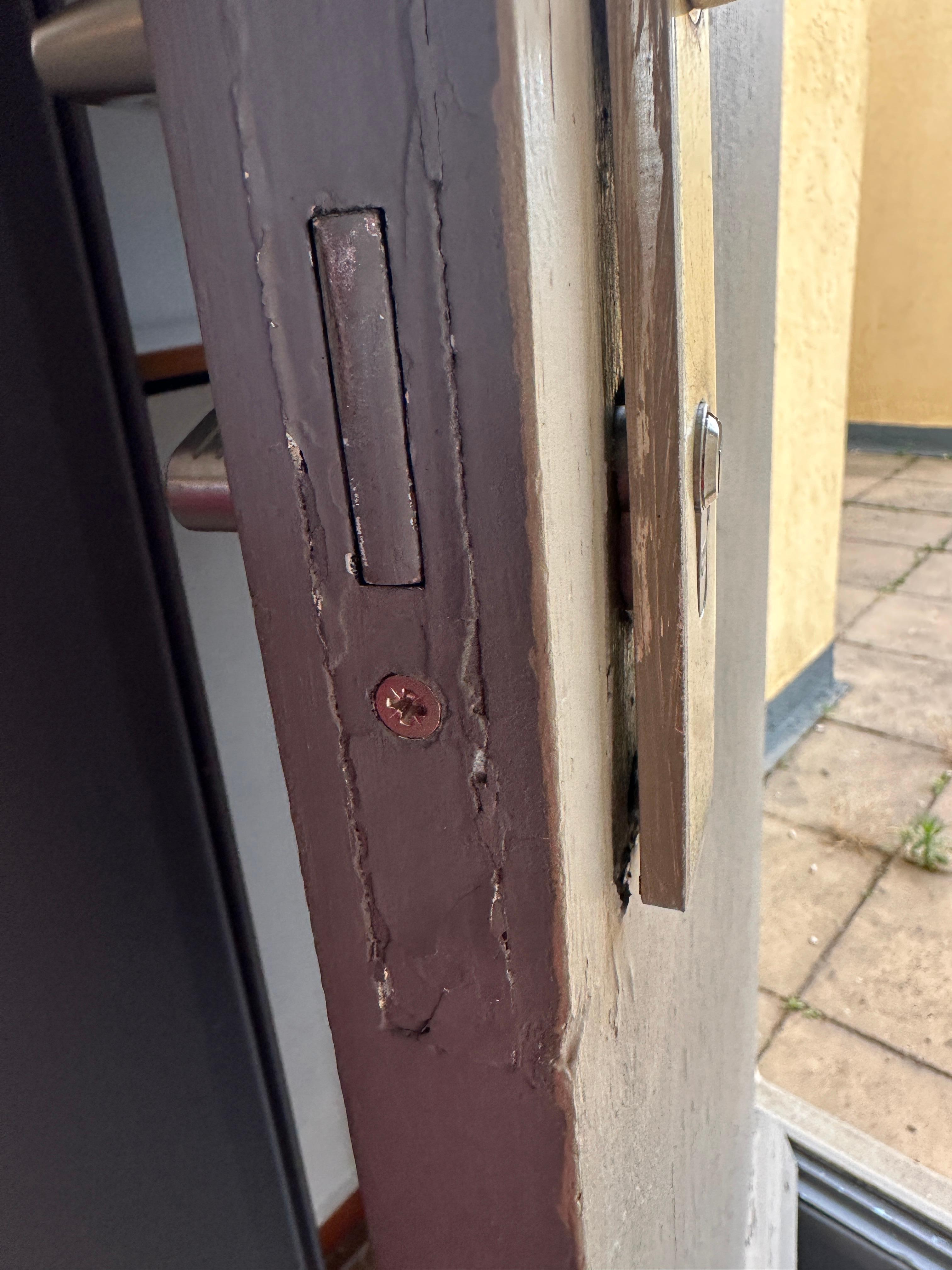 Door looked like it had been forced, a chunk fell out when first opened.  Lock not fully installed.