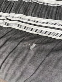 Ripped bedspread