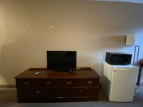 Missing hardware, wood disintegrating into the carpet.