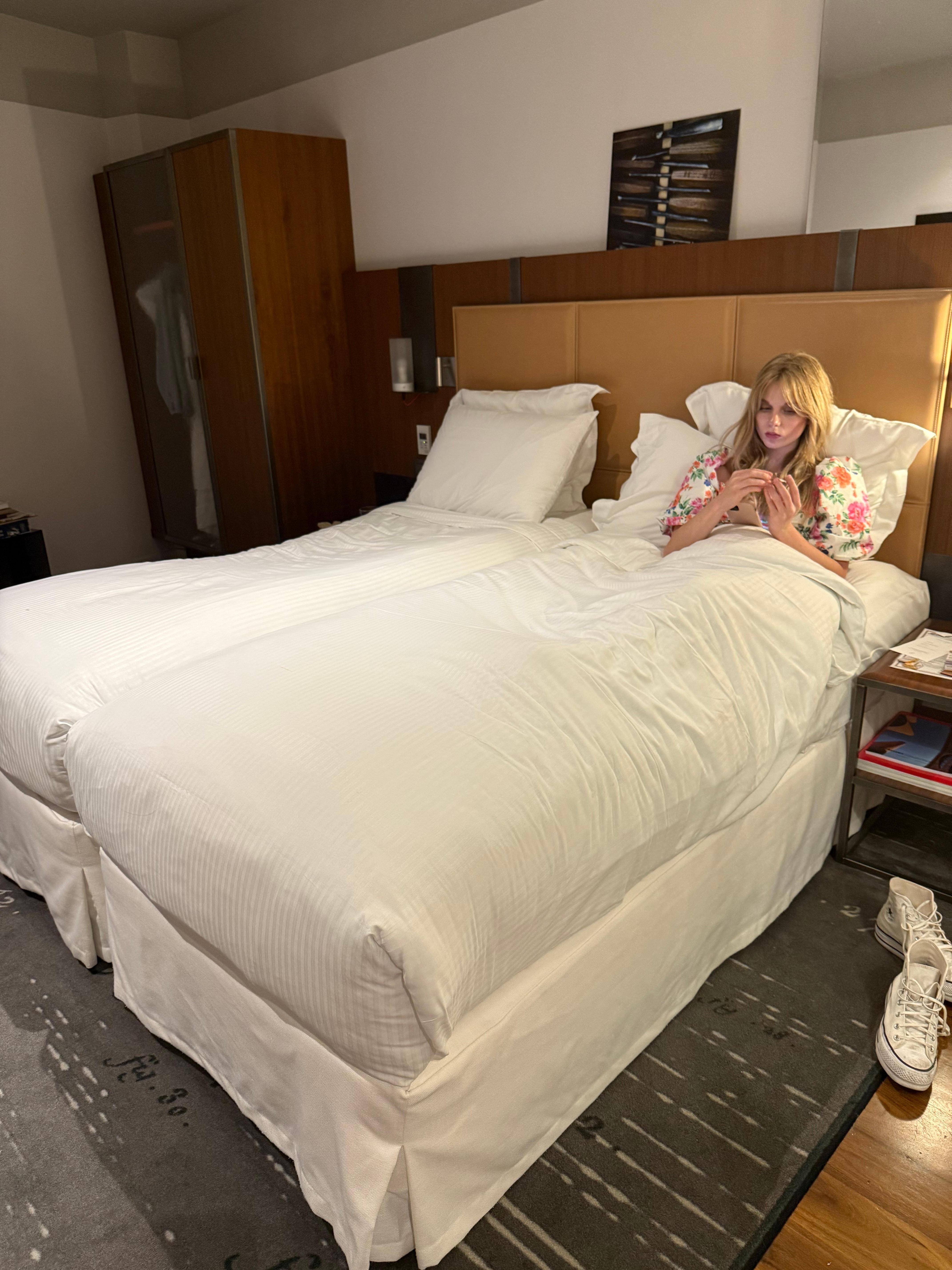My daughter relaxing in the cushy bed!