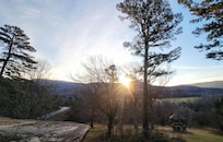 Watching the amazing sunrise from the front porch.