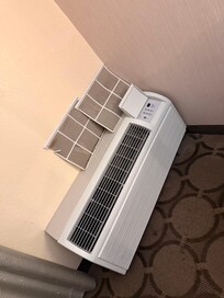 1st room given. This was the view. Thermostat falling off the wall.