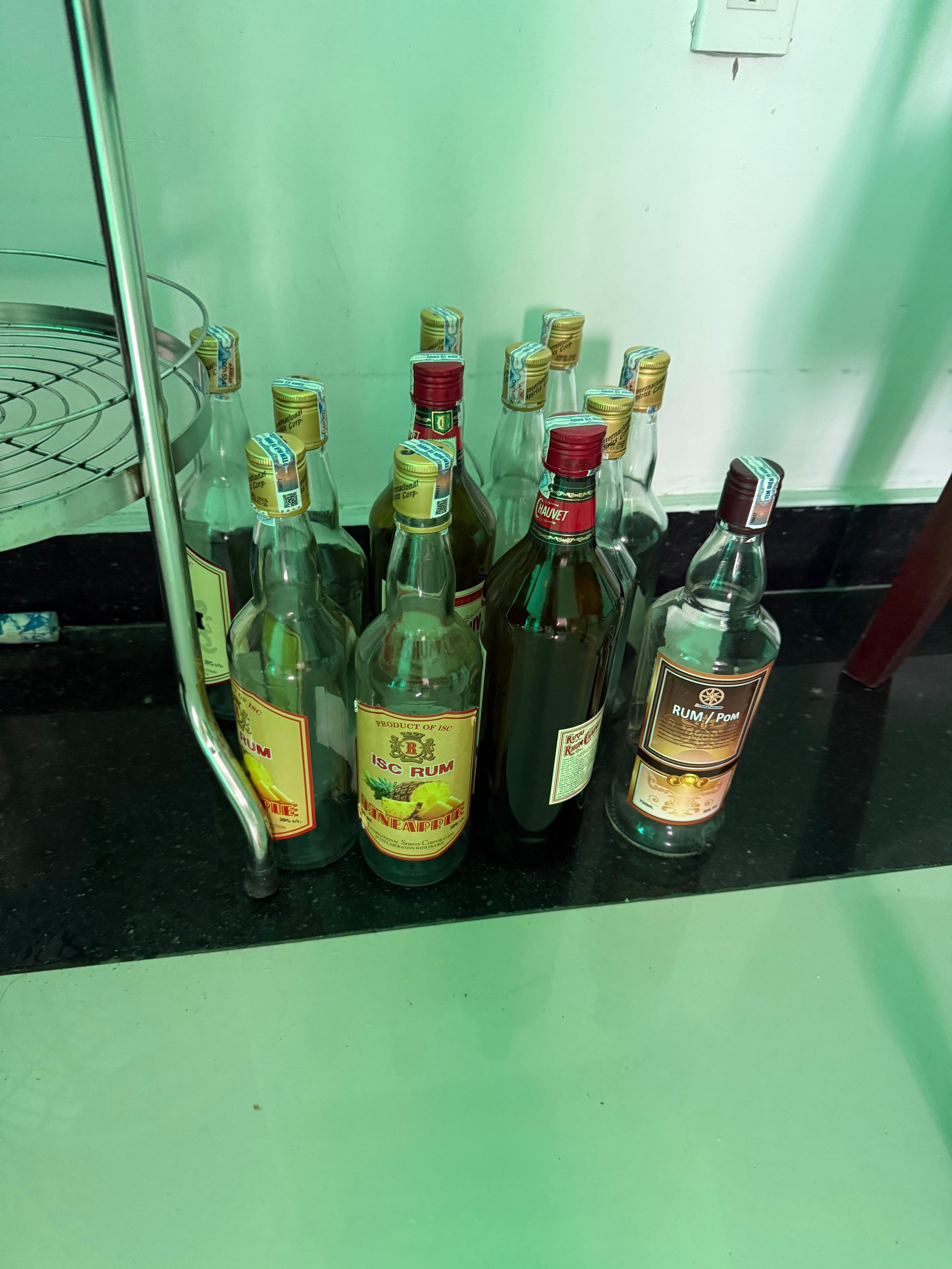 One day’s worth of empty alcohol bottles from my floor