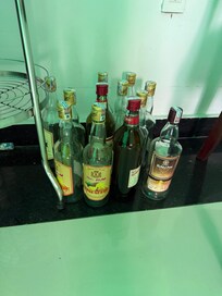 One day’s worth of empty alcohol bottles from my floor