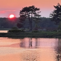 Sitting on the lawn of Lane’s Privateer Inn watching the sun set!