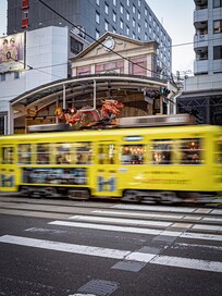 Hotel is the top left building.