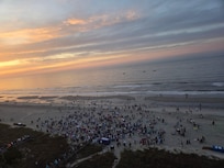 As the sun was rising, the group attending the service were gathering.