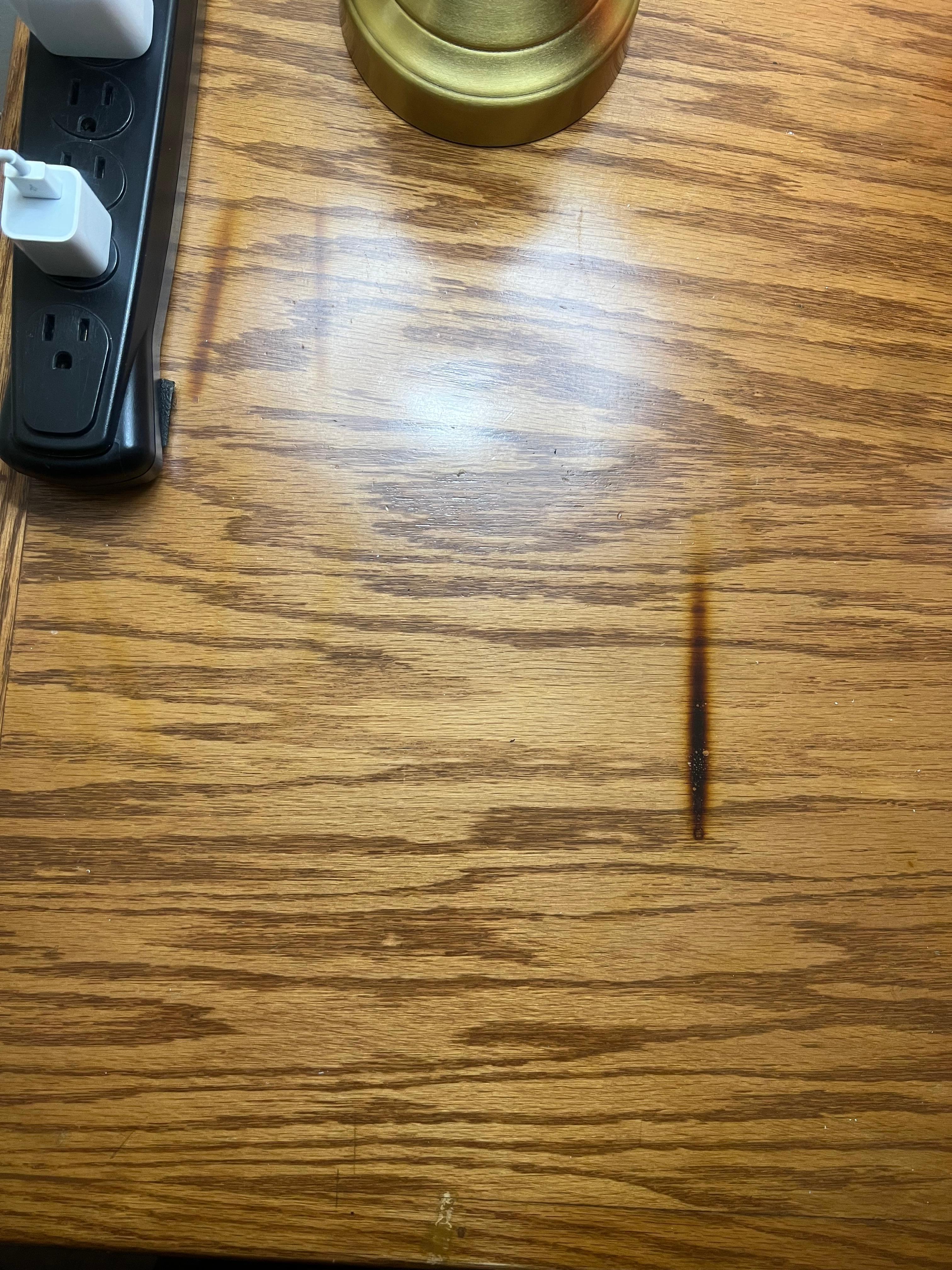 Burn marks on the desk