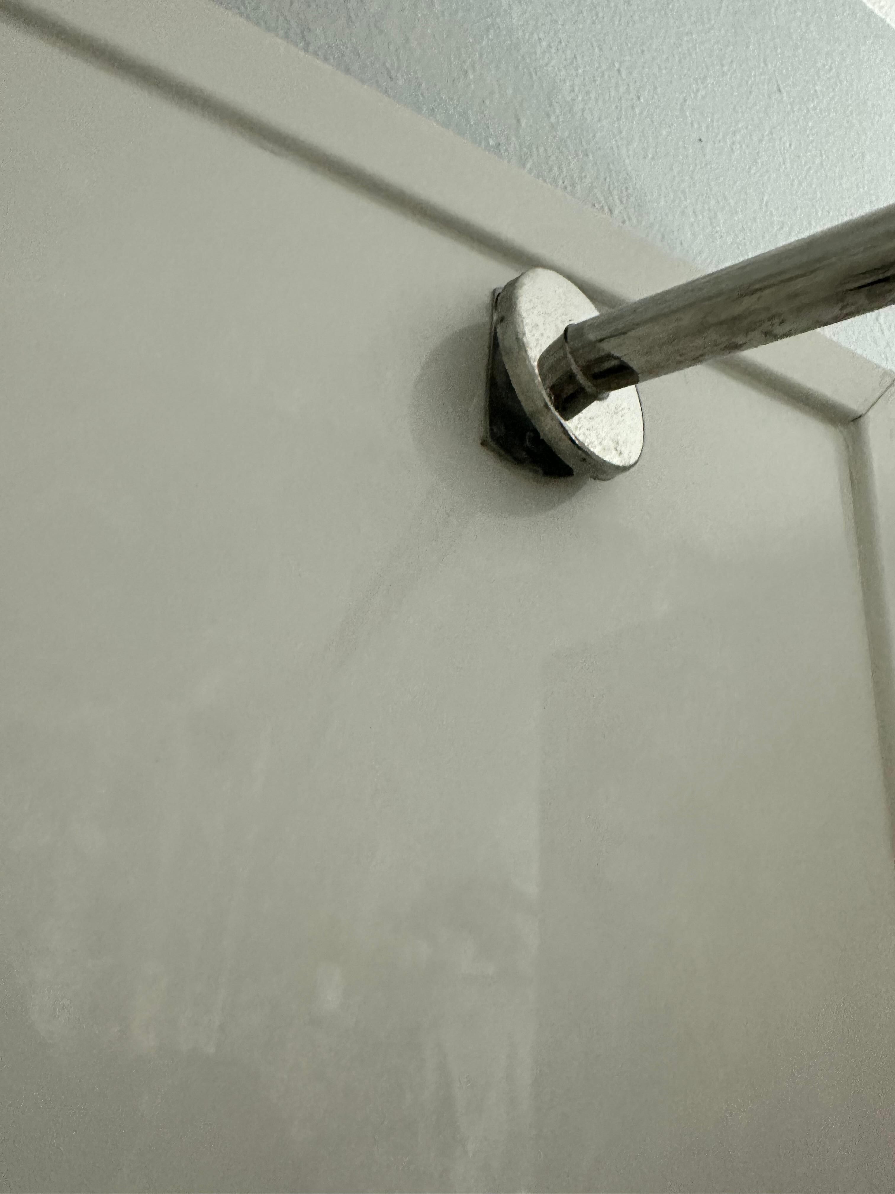 Shower rod coming out of the walls 